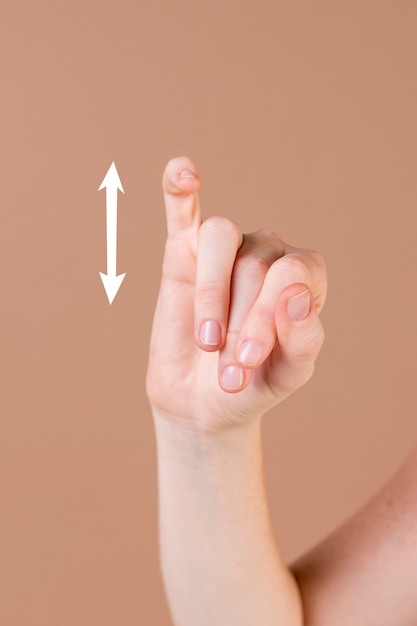 Foto gratuito cerca de una mano enseñando el lenguaje de señas