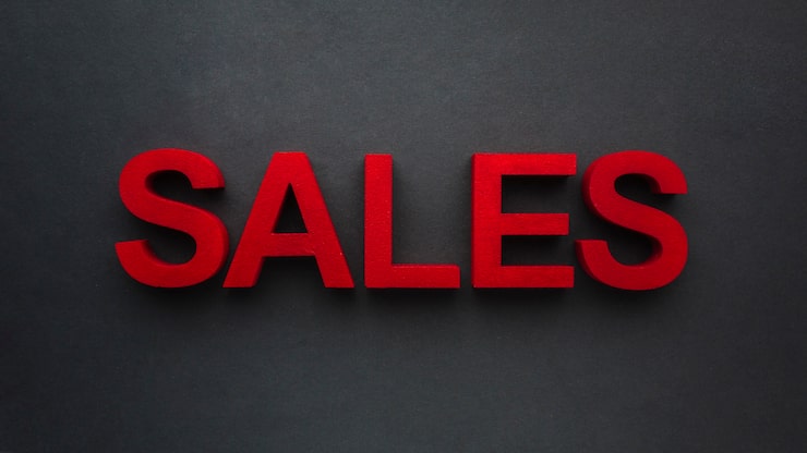 Foto gratuito concepto de ventas sobre fondo negro