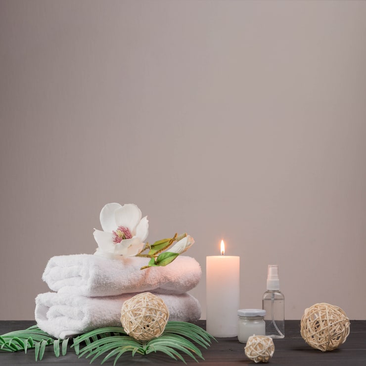 Foto gratuito elementos naturales para spa con velas