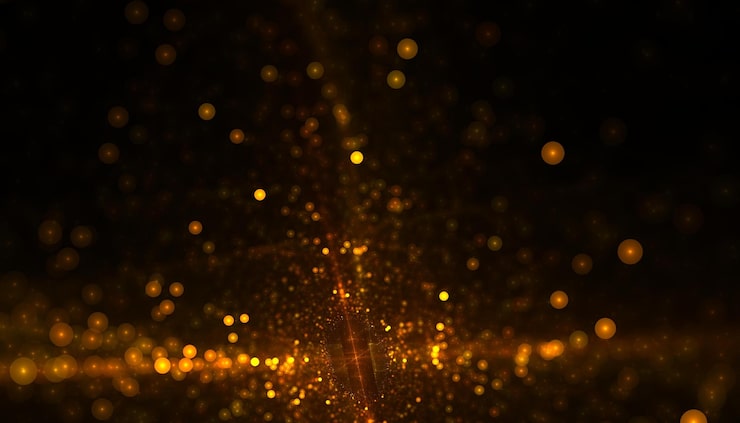 Foto gratuito el fondo de brillo dorado estallando con efecto bokeh