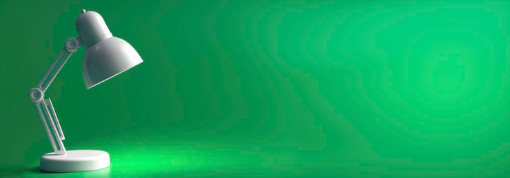 Foto gratuito lámpara de mesa blanca en un espacio de copia de fondo verde
