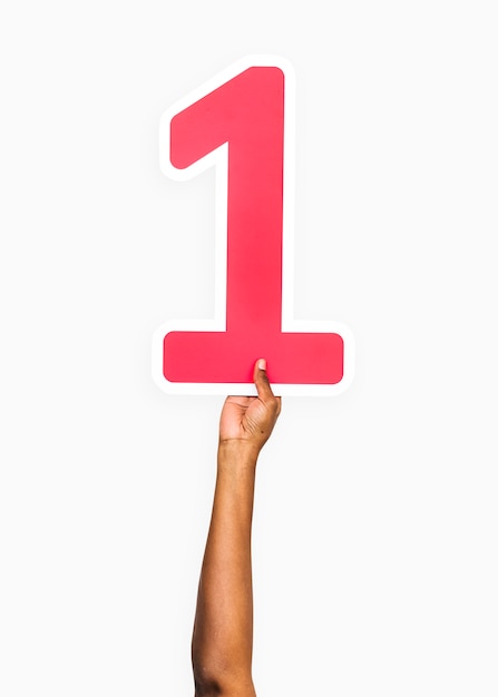 Foto gratuito manos sosteniendo el numero 1