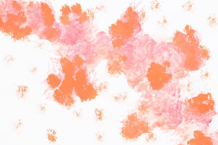 Foto gratuito salpicaduras de pintura naranja acuarela