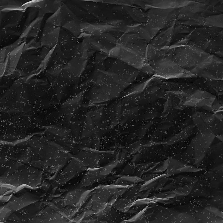 Foto gratuito textura de papel negro arrugado