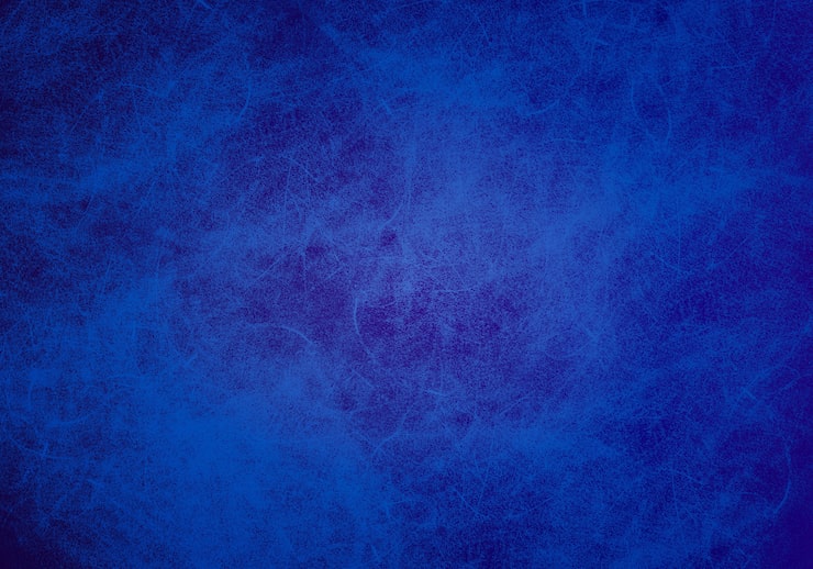 Foto gratuito textura de pared azul desgastada