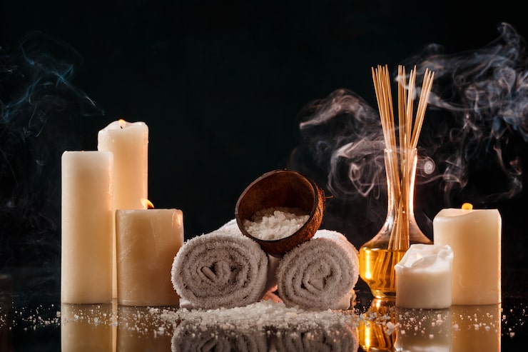 Foto gratuito tratamiento de spa sobre pared oscura