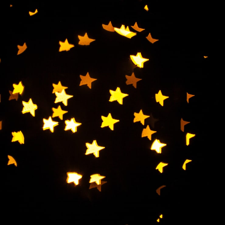 Foto gratuito granelli di luce a forma di stella