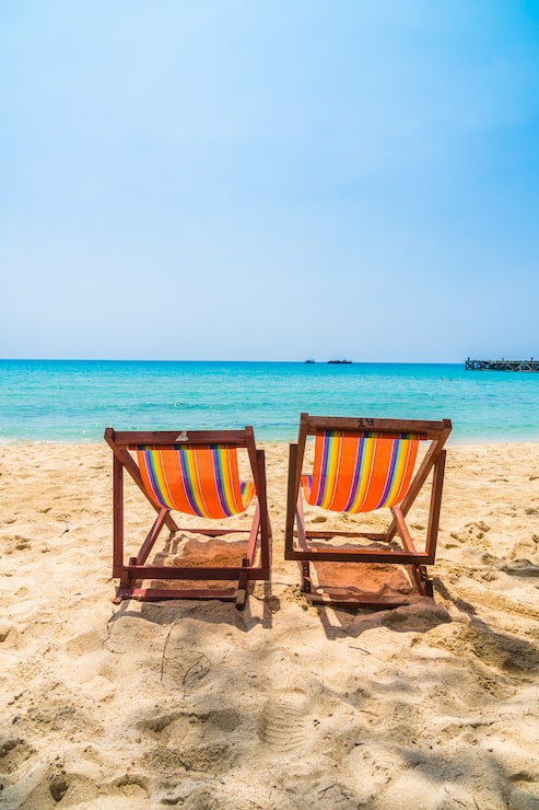 Foto gratuito sedia sulla spiaggia
