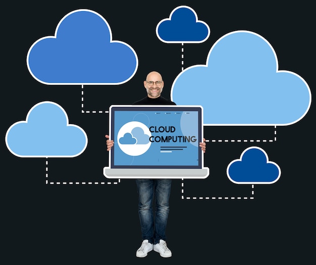 Zdarma Fotografie programátor držící notebook s cloud computingem