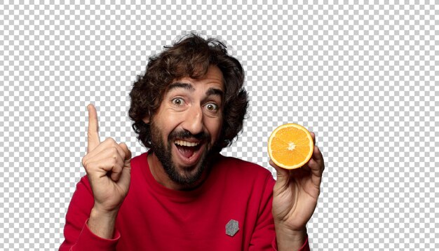 Kostenlose PSD junger, erwachsener, bärtiger mann mit einer orange