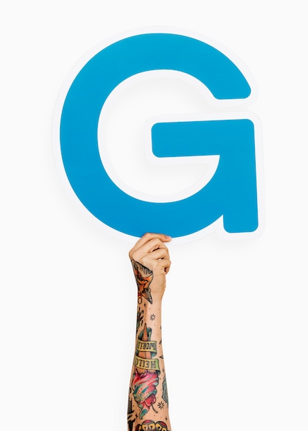 Gratis Foto hånd som holder bokstaven g