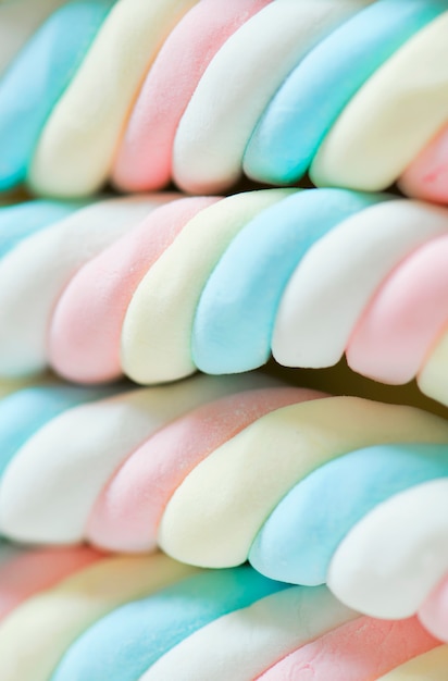 Gratis Foto nærbilde av vridd marshmallow-bakgrunn