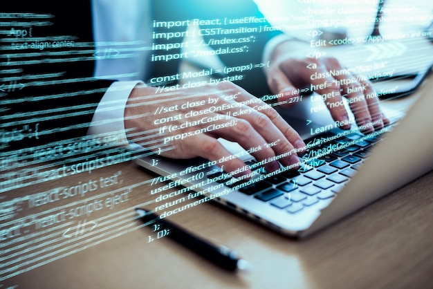 Gratis Foto programming background with person working with codes on computer