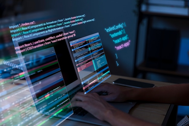 Gratis Foto programming background with person working with codes on computer