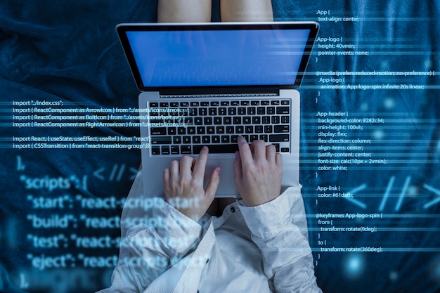 Gratis Foto programming background with person working with codes on computer