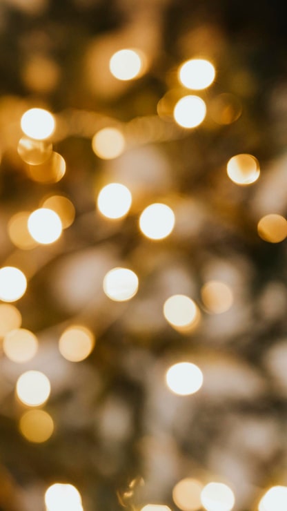 Gratis Foto uklar varm julebokeh lys mobil bakgrunnsbilde