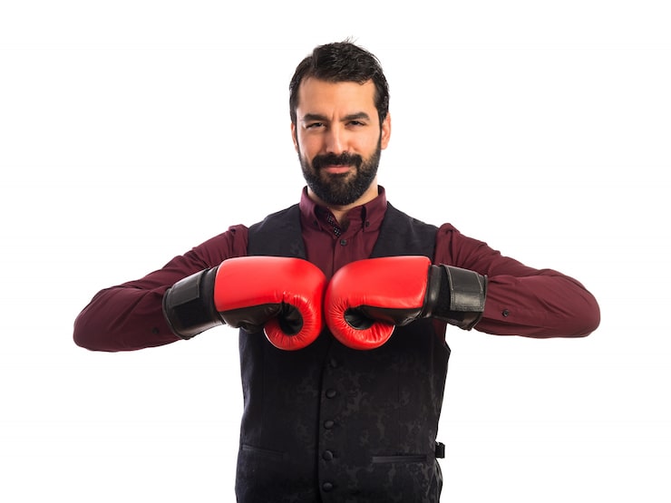 Gratis Bild man i väst med boxningshandskar