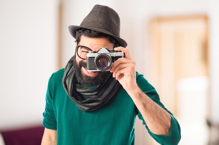 Gratis Foto mand fotograferer