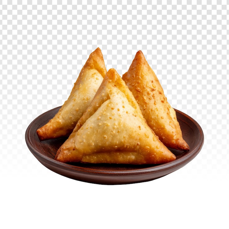 Gratis PSD läcker gyllene samosas på en tallrik