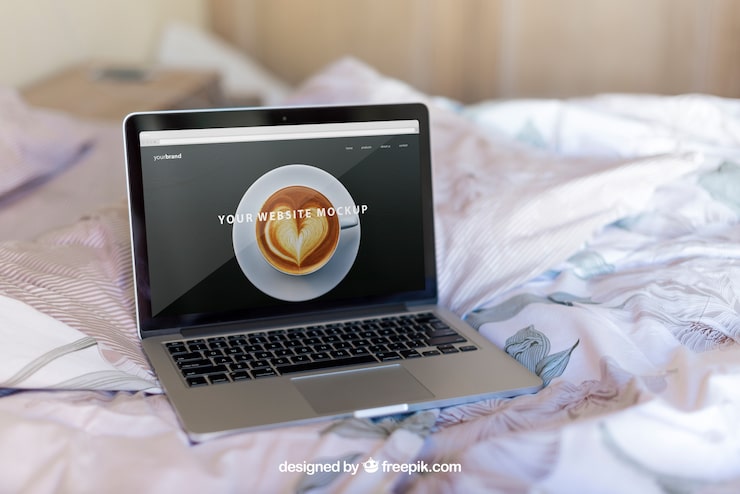 Gratis PSD laptop på seng