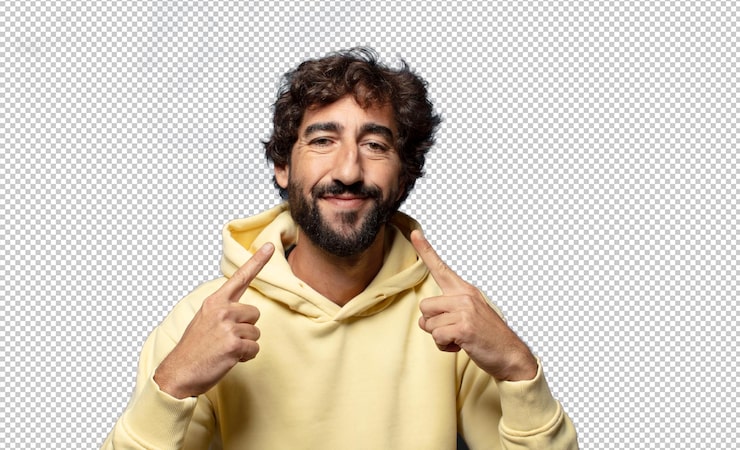 Gratis PSD smiler selvsikkert og peger på sit eget brede smil, positiv, afslappet og tilfreds holdning