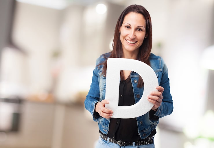 Miễn phí Photo người phụ nữ cầm chữ "d"