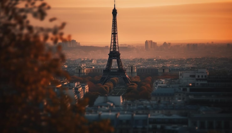 Photo gratuit un coucher de soleil sur la tour eiffel depuis paris
