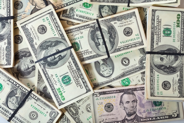 Photo gratuit fond de billets de dollars