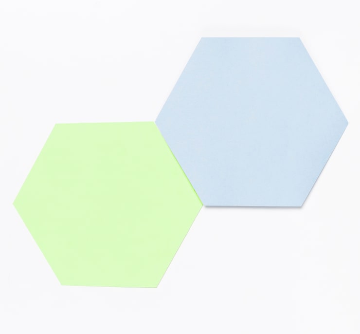 Photo gratuit hexagone en papier coloré en vue du haut