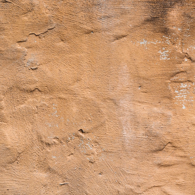 Photo gratuit texture de mur peint brun avec des fissures