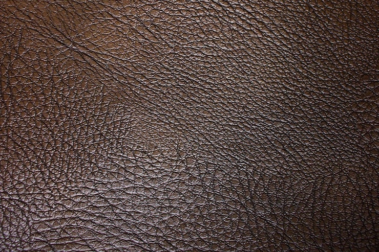 Bild en brun lädertextur med en grov textur.