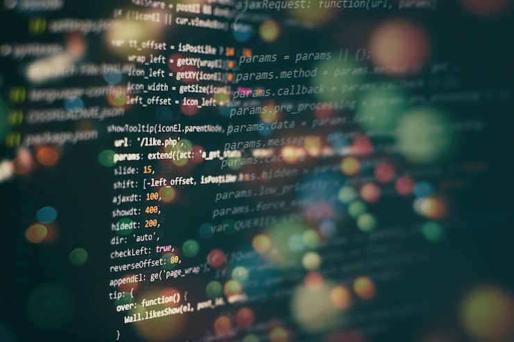Photo developer programming code. abstract computer script code. programming code screen of software developer. software programming work time.