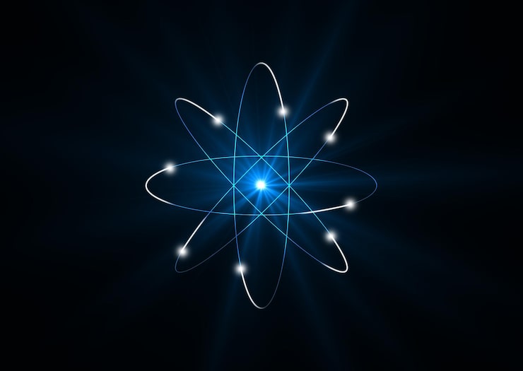 Zdjęcie zbliżenie abstrakcyjnego atomu na czarnym tle