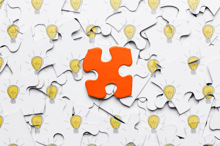 PSD konsep puzzle dengan satu potongan puzzle merah