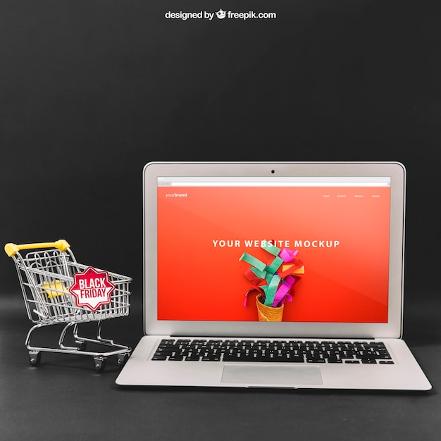 Zdarma PSD mockup black friday s notebookem